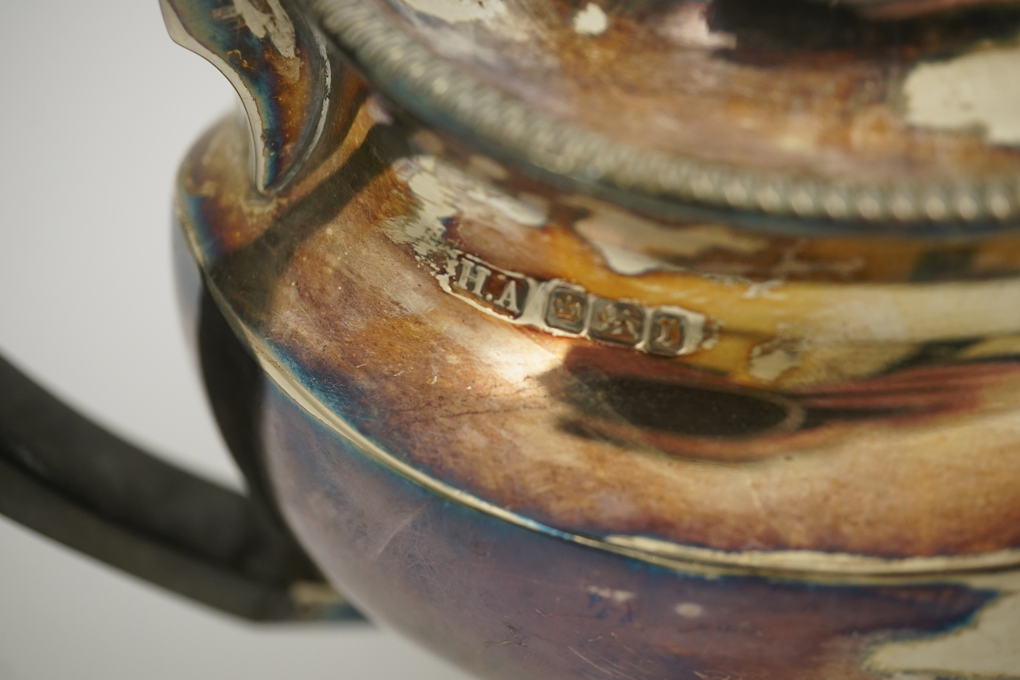 An Edwardian silver teapot and a matching sugar bowl, with engraved inscription, relating to the Royal Fusiliers, by Atkin Brothers